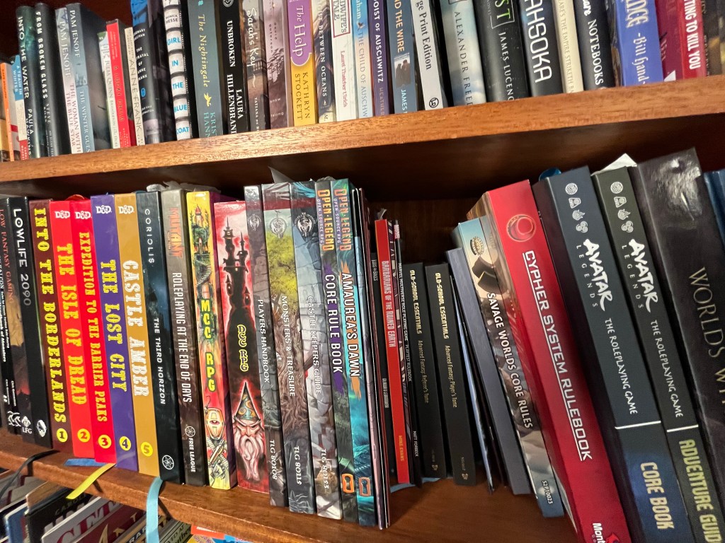 My ttrpg book shelf.