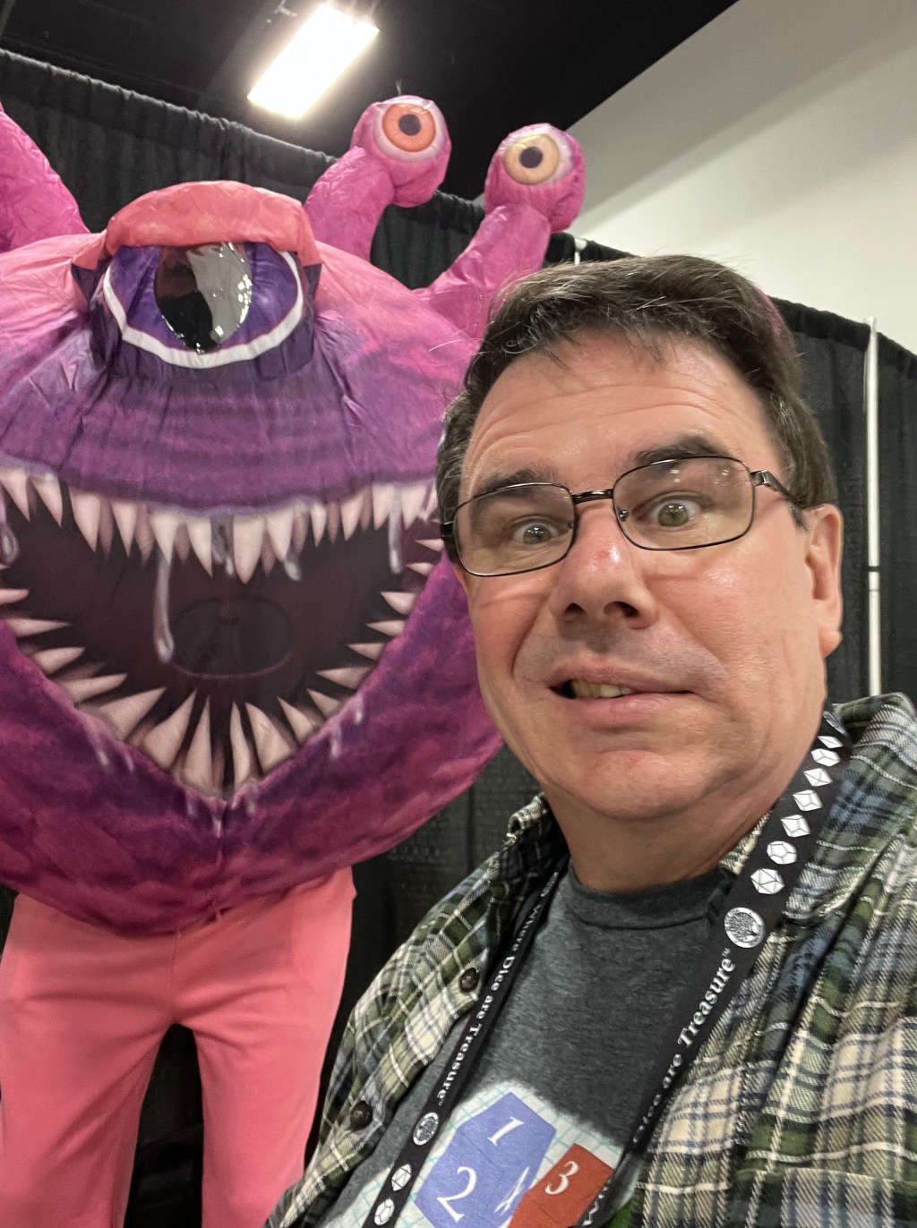 Wes looking rather uncertain as a beholder leers over him in the background.